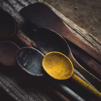 wooden spoons used for natural dyeing colored by pigments